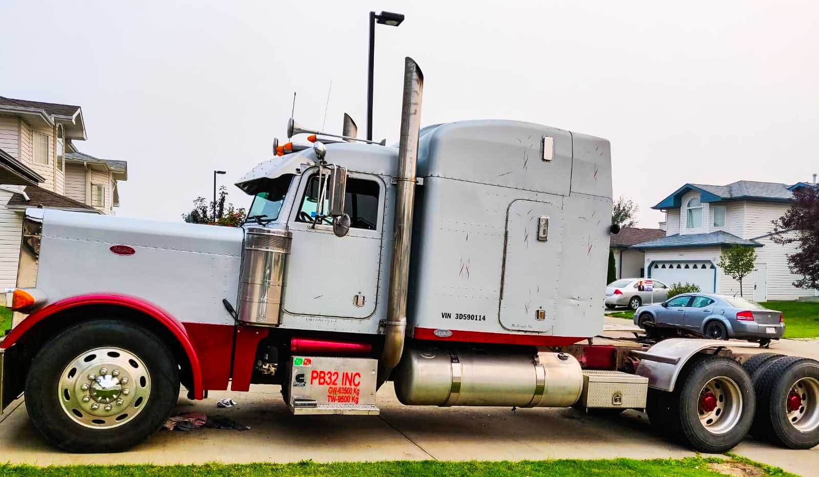 Silver and red PB32 truck